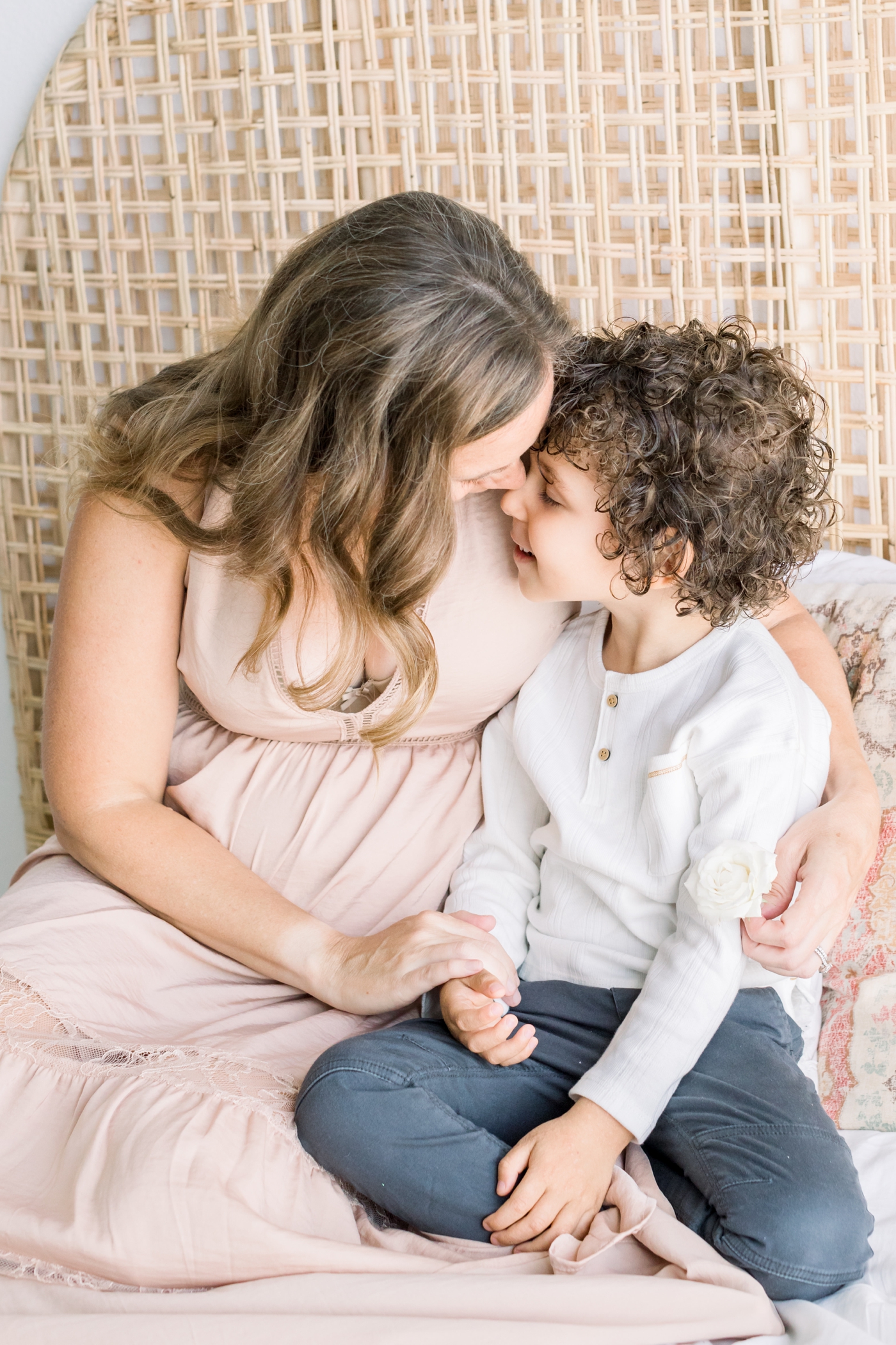 Sweet image of Mom with son during Celebrating Motherhood Event in 2020. Photo by Austin family photographer, Sana Ahmed Photography.