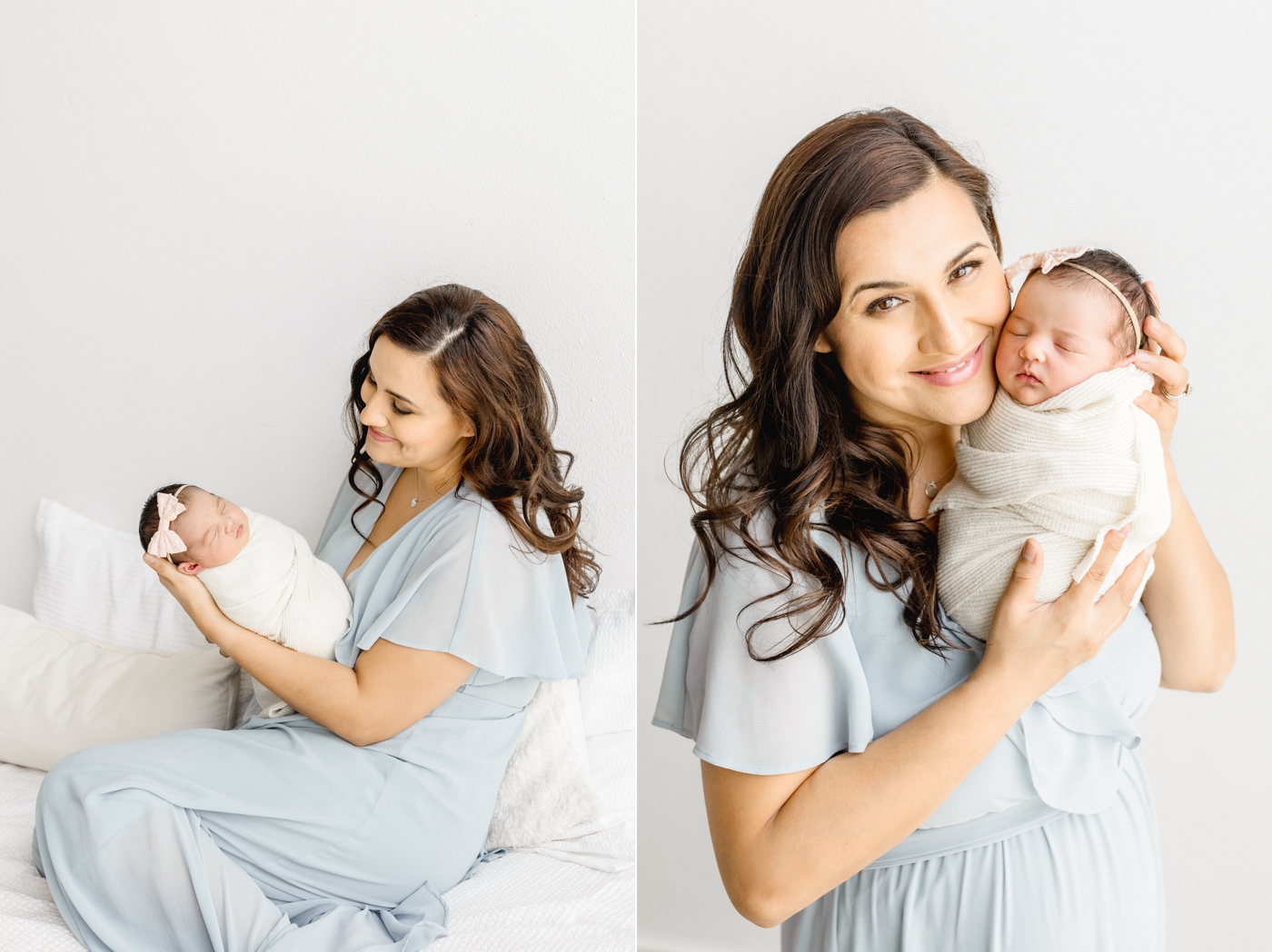 Mom holding baby girl in white swaddle during studio newborn session. Photo by Sana Ahmed Photography.