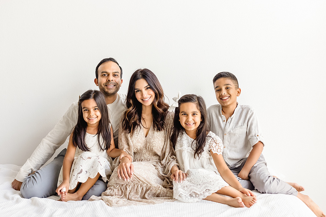 Traditional family portrait of family of five by Austin, family photographer, Sana Ahmed Photography.