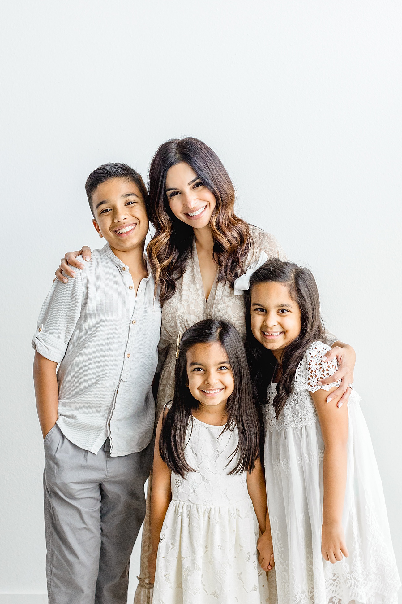 Beautoful portrait of Mom, Nasreen from the blog Hey Nasreen, with her children. Photo by Sana Ahmed Photography.