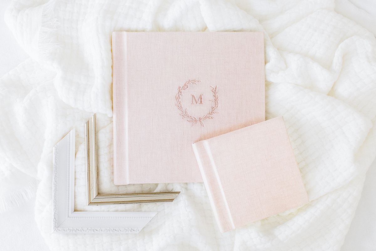 Pink linen album with frame corners. Photo by Sana Ahmed Photography.