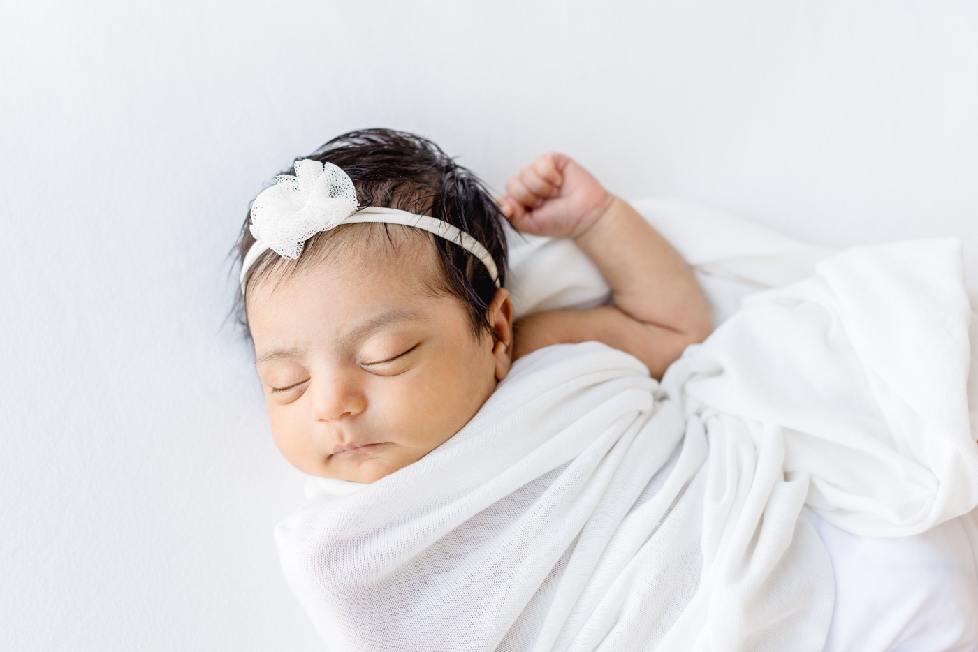 Closeup of baby girl as she sleeps. Photo by Austin newborn photographer, Sana Ahmed Photography.