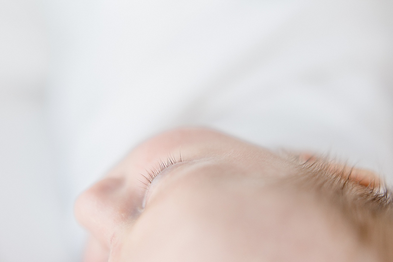 Eyelash details on baby during newborn photos with Sana Ahmed Photography.