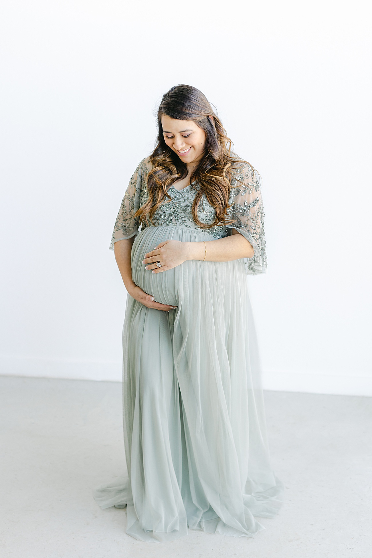 Stunning Mama-to-be during her maternity session for first baby. Photo by Austin maternity photographer, Sana Ahmed Photography.