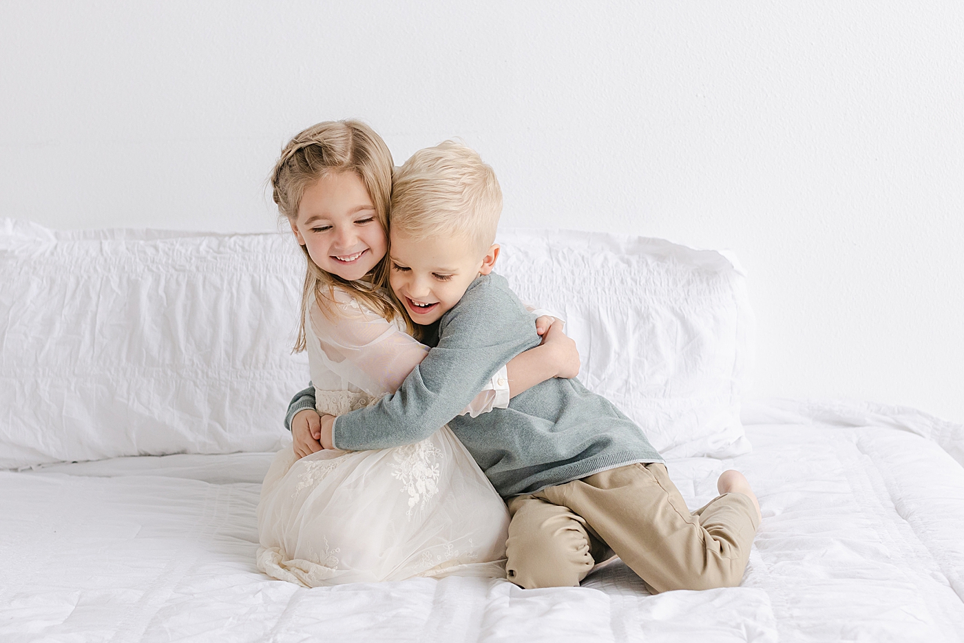 Brother and sister hugging | Photo by Sana Ahmed Photography