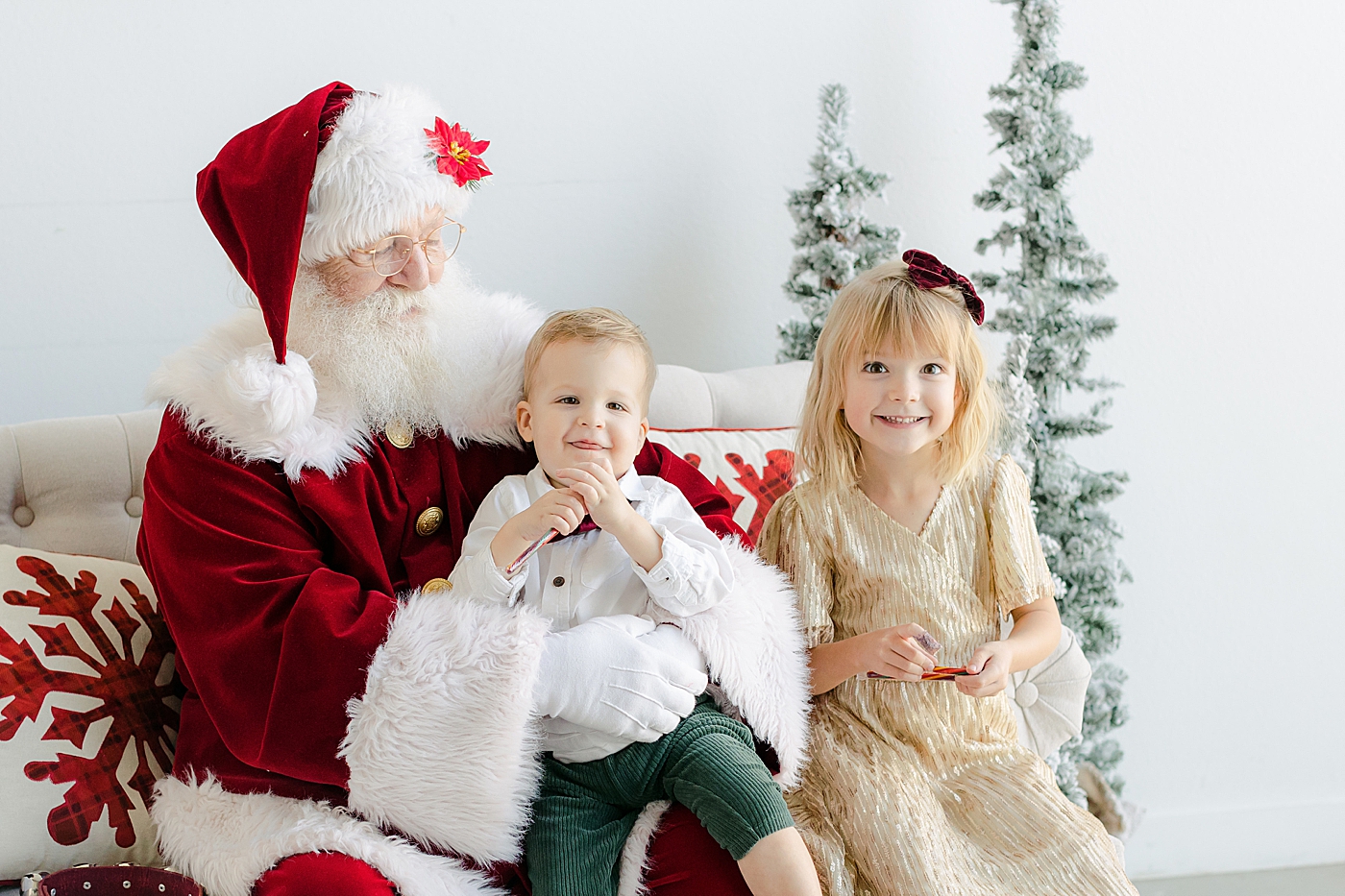 Brother and sister sitting with Santa | Images by Sana Ahmed Photography