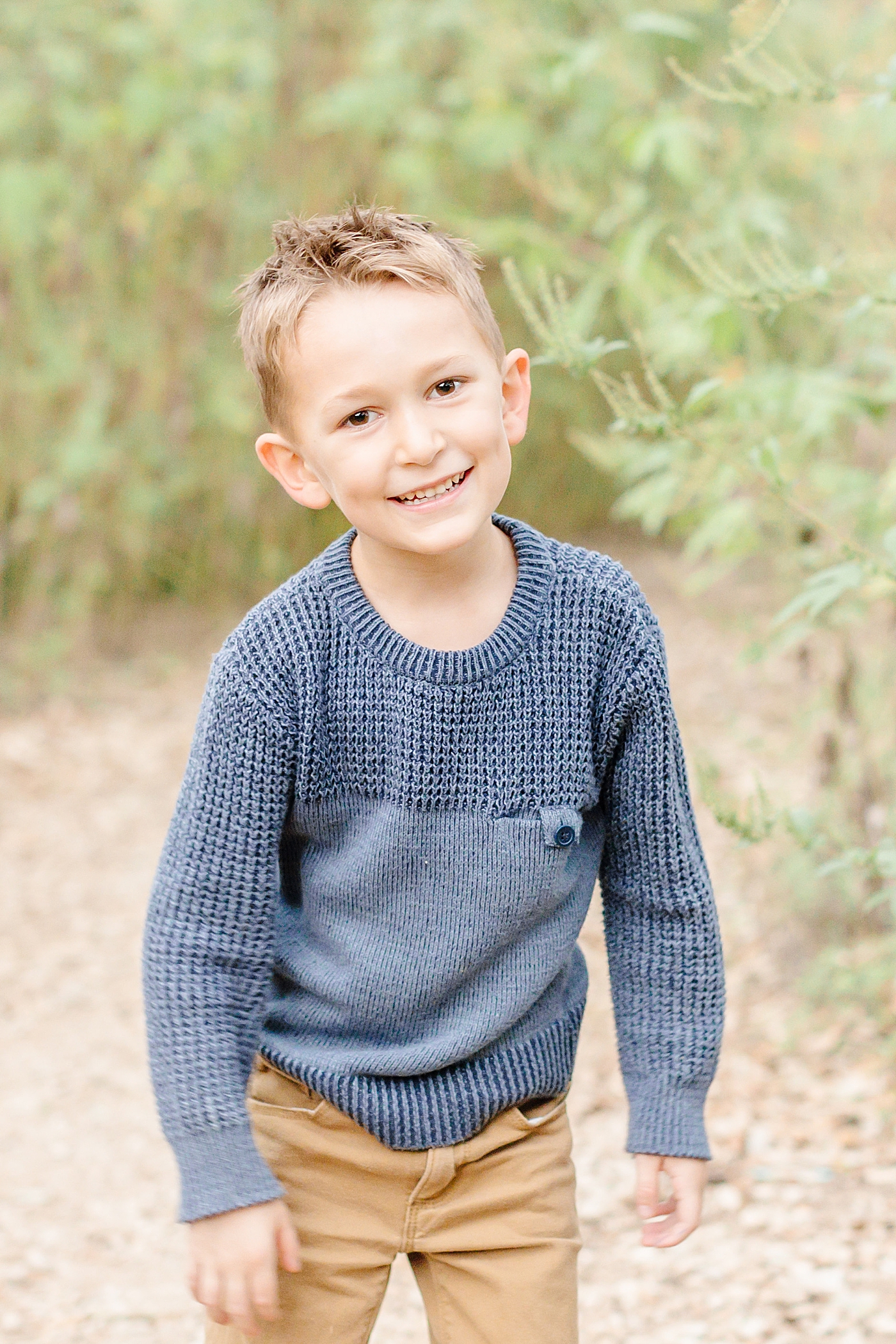 Little boy in navy blue sweater | Outdoor Family Sessions with Sana Ahmed Photography