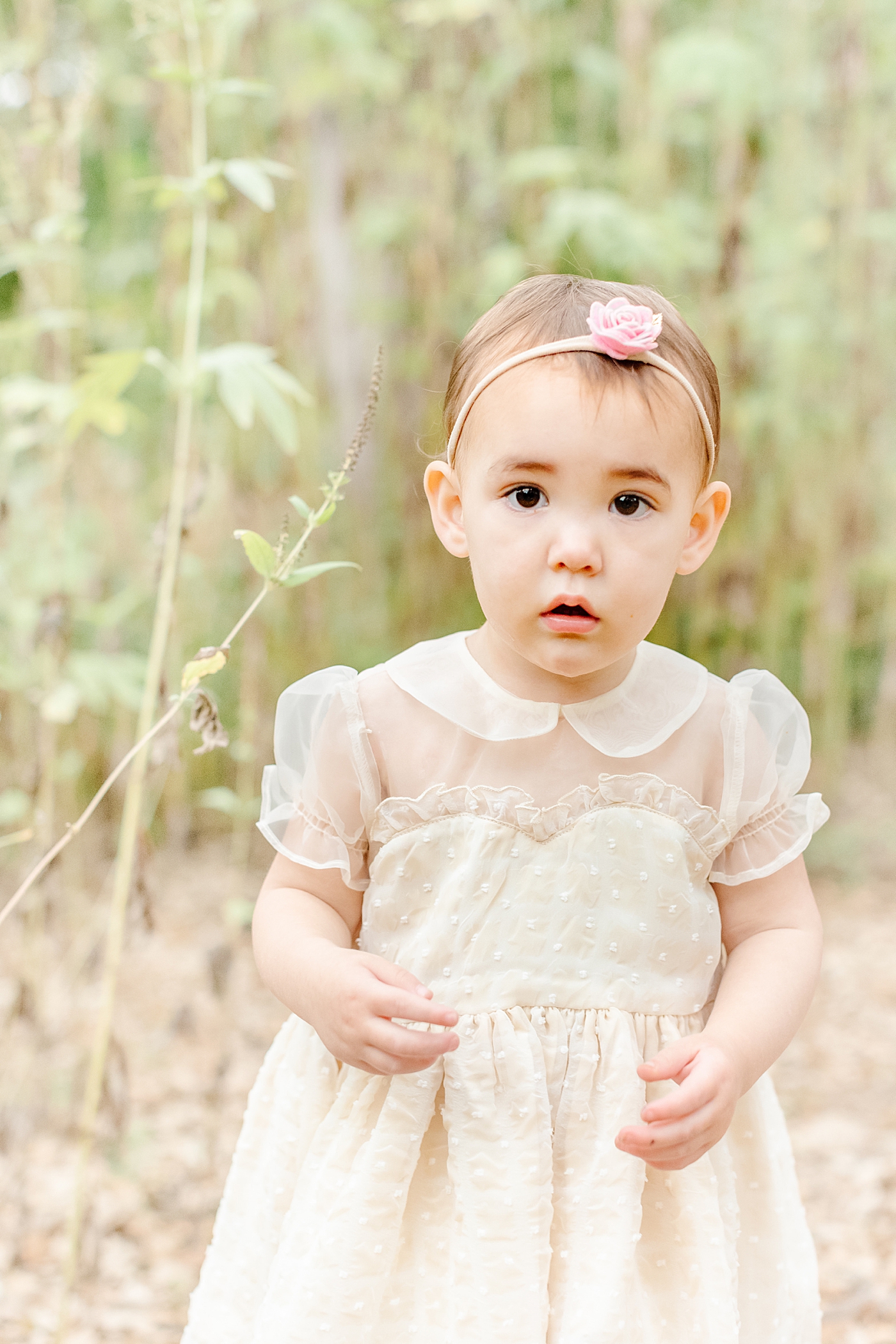 Little girl in a cream dress | Outdoor Family Sessions with Sana Ahmed Photography