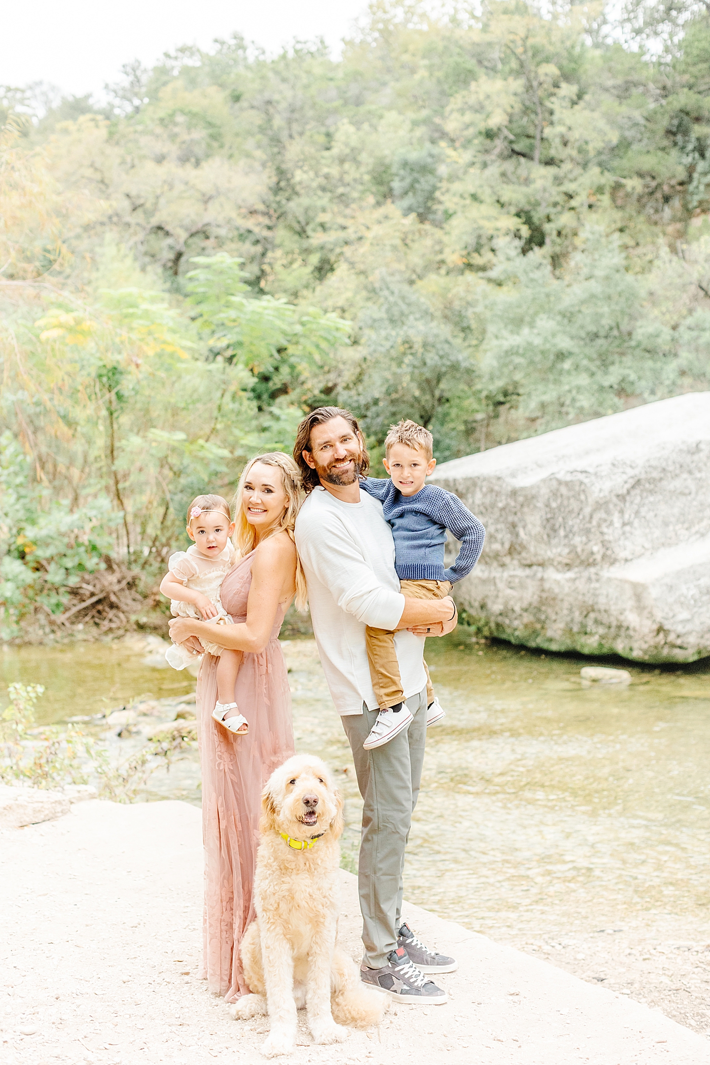 Mom and dad with their kids and dog near water | Outdoor Family Sessions with Sana Ahmed Photography