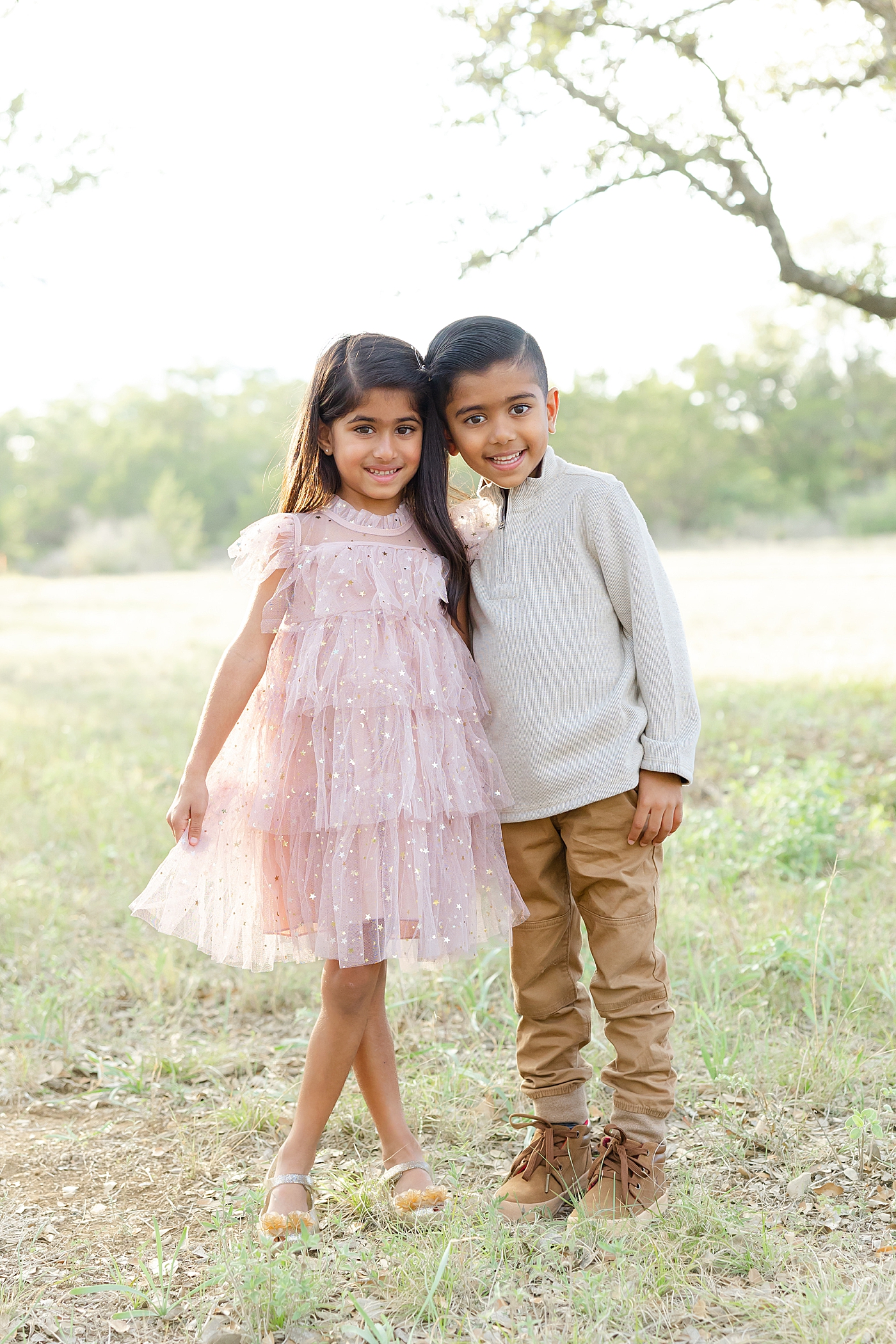 Little boy and girl siblings in the park | Image by Sana Ahmed Photography