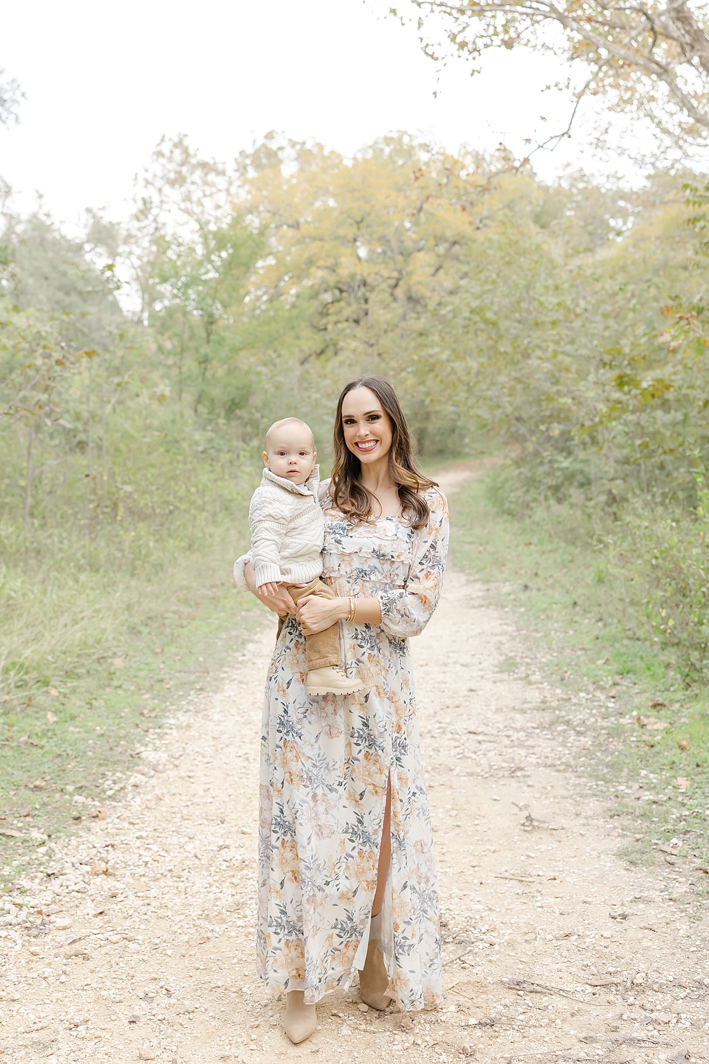 Mom holding her baby boy during their Spring Family Sessions in Austin | Image by Sana Ahmed Photography