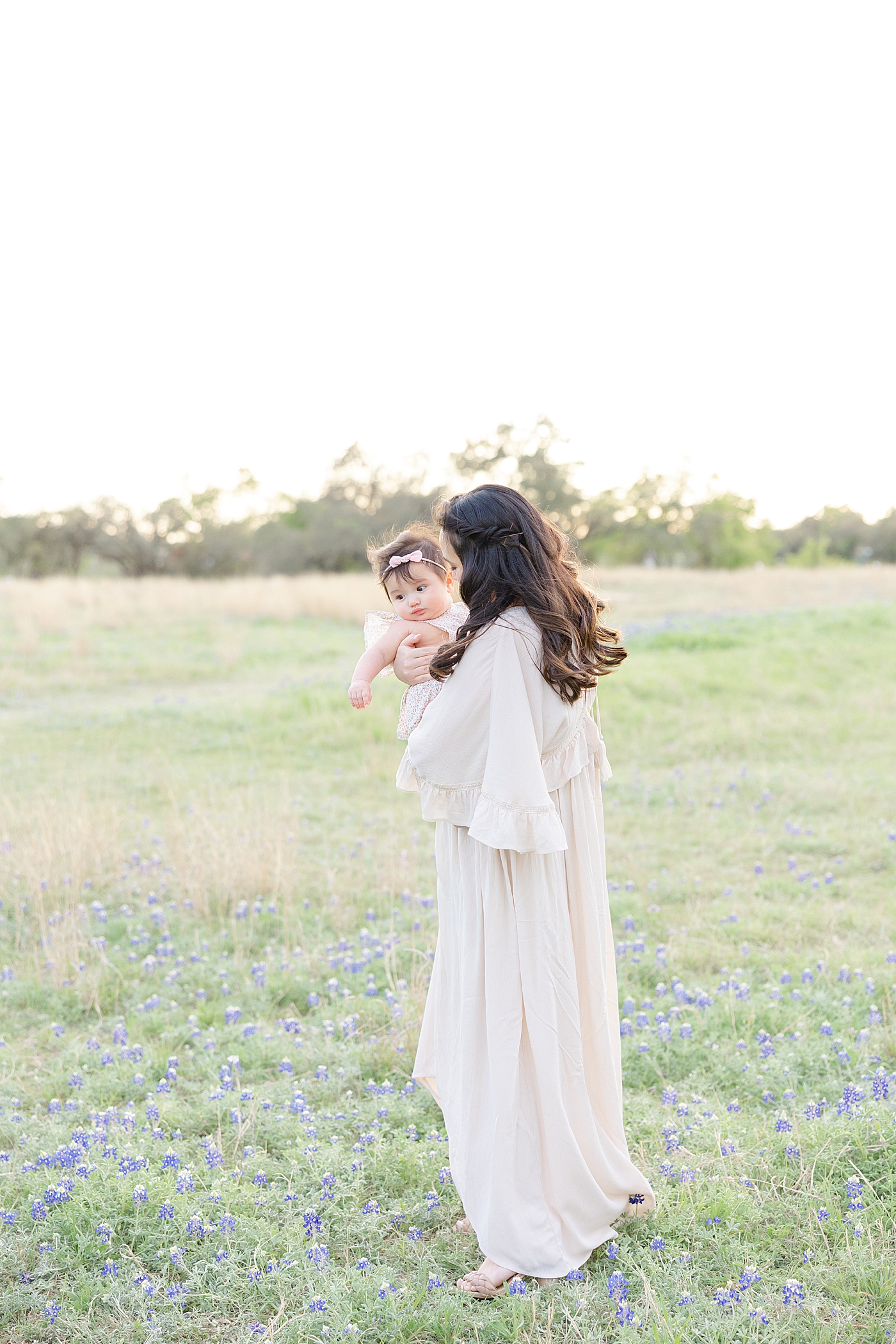 during their Milestone Session with Texas Bluebonnets | Image by Sana Ahmed