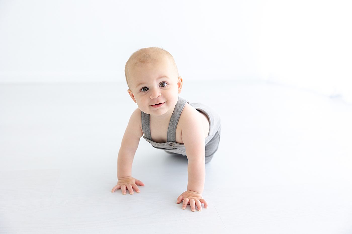 Baby boy practicing crawling | Image by Sana Ahmed Photography